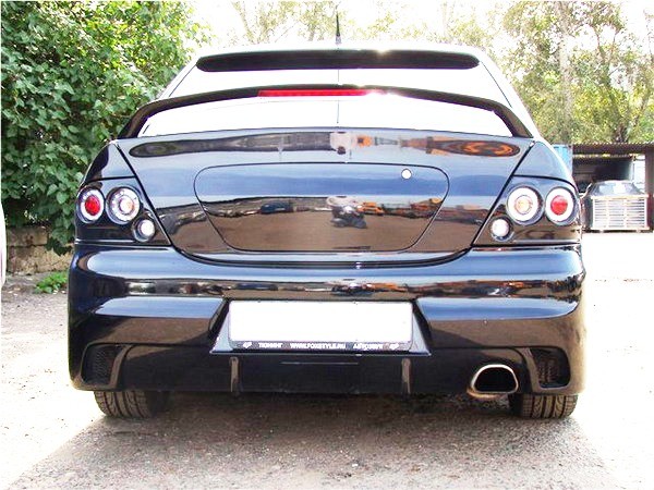 Декоративная заглушка крышки багажника в стиле EVO для Mitsubishi Lancer IX (2003-2009) купить недорого с доставкой в Санкт-Петербург