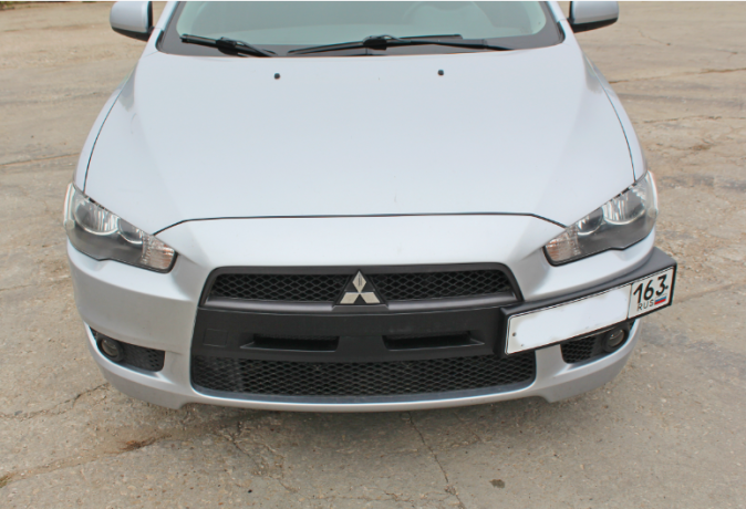 Рамка под номер на передний бампер для Mitsubishi Lancer X (2007-2016) купить недорого с доставкой в Санкт-Петербург