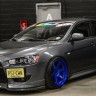 Спойлер переднего бампера (под клыки) для Mitsubishi Lancer X купить недорого с доставкой в Санкт-Петербург